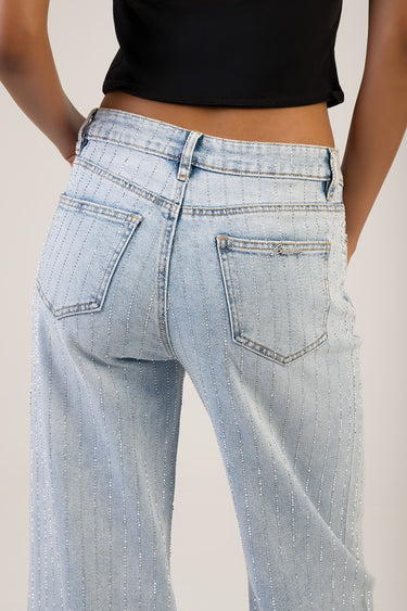 back view of light blue wide leg jeans with silver glitter stripes and back pockets