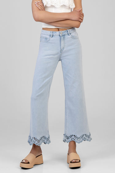light wash cropped wide leg jeans with scalloped lace hem, paired with beige platform sandals