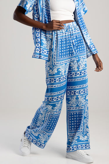blue and white patterned wide leg trousers with elastic waist, shown with a matching jacket by Blue Jean Traders