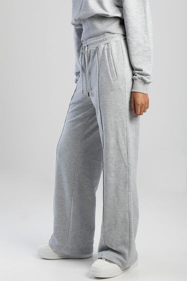 grey fleece sweatpants by Blue Jean Traders with a drawstring waist, side pockets, and a small logo on the thigh, shown