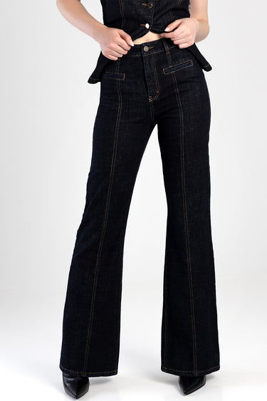 dark indigo flare jeans with orange topstitching, high waist, front pockets and button closure, with black boots