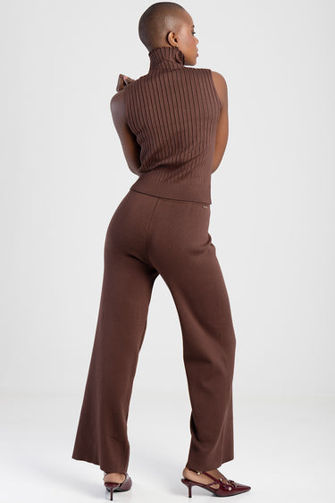 woman in brown ribbed sleeveless knit top and wide leg pants, back view, Blue Jean Traders.