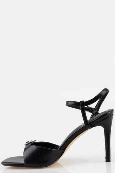 black leather heeled sandal with slender ankle strap and front band, side view