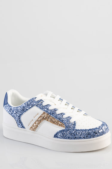 white low top sneakers with blue glitter trim and a gold glitter side stripe and white laces