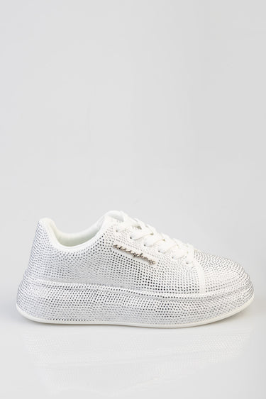 blue jean traders white studded sneaker with rhinestone detailing and white laces, side view