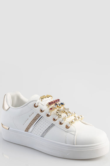 white sneakers by Blue Jean Traders featuring jewel encrusted lace charms and metallic side stripes