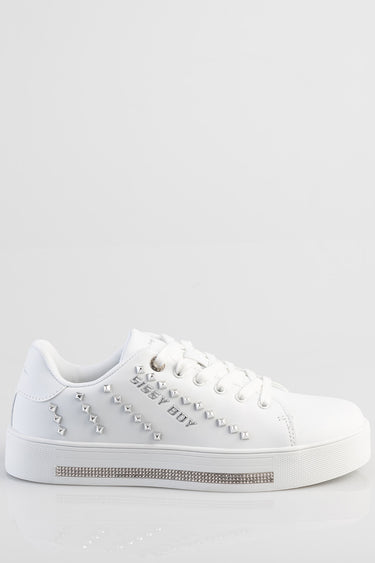 white low top sneaker with silver stud embellishments along the side and a rhinestone stripe on the midsole by Blue Jean