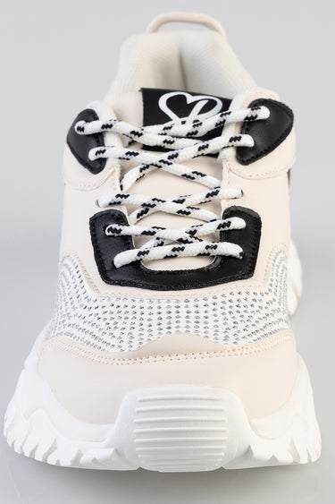 beige and white sneaker with black eyelet panels, white and black lace, mesh upper with grey speckled texture, chunky white