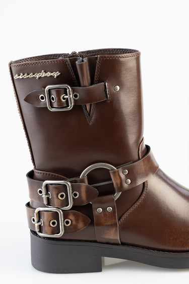 brown leather boot with multiple silver buckles and rings, stacked straps, sturdy sole