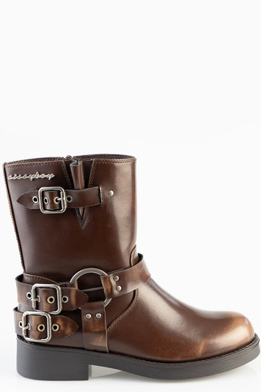 brown leather mid calf boot with multiple buckled straps and silver hardware and a chunky sole