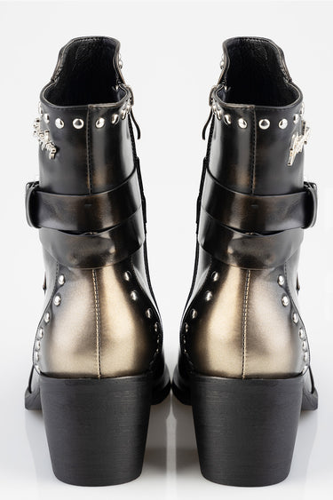 pair of black metallic ankle boots with silver studs and buckled straps, back view