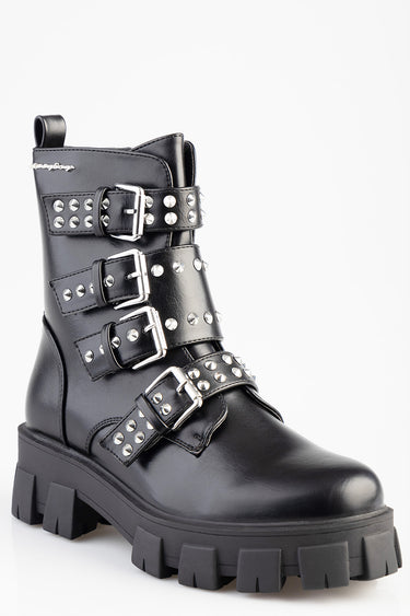 black leather boot with multiple silver studs and four buckle straps, chunky lug sole.