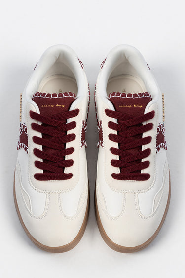top view of two white sneakers with maroon laces and stitched panels, gum sole, by Blue Jean Traders