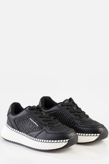 blue jean traders sneakers with black knit upper and white ribbed platform sole, lace up