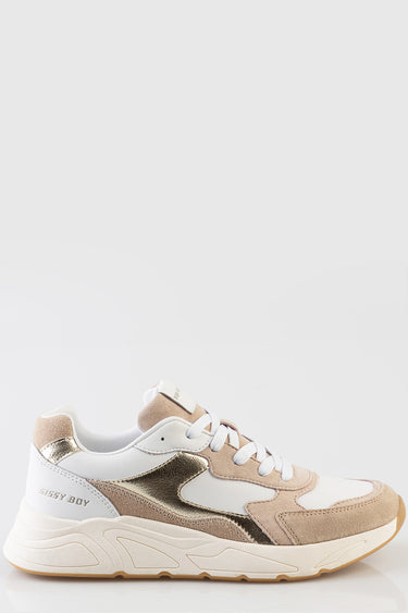 blue jean traders white and beige chunky sneaker with metallic gold panels and a thick sole