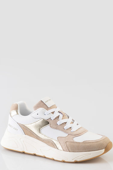 white and beige chunky sneakers with metallic gold accents, white laces and a sculpted sole
