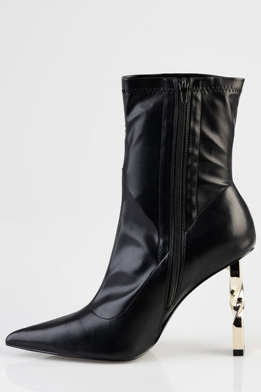 Blue Jean Traders black leather ankle boot with a side zipper and sculpted gold heel.