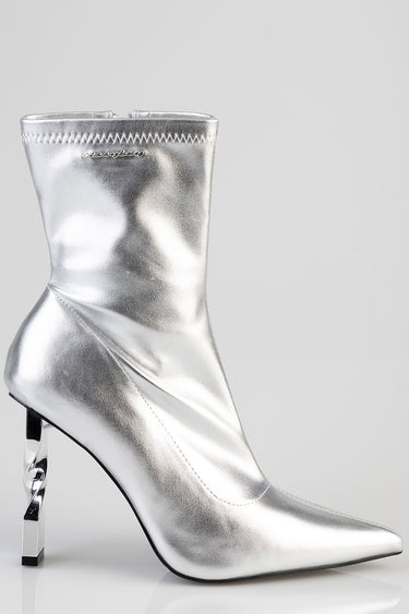 silver metallic mid calf boot with pointed toe and sculpted twisted heel