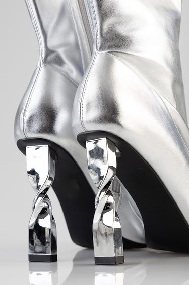 Blue Jean Traders metallic silver boots with sculpted chrome heels