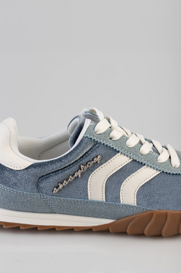Blue Jean Traders sneakers in blue denim with white side stripes, white laces, light grey suede accents and gum sole