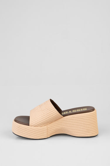 beige platform wedge sandal with a single wide woven strap and a rope like sole