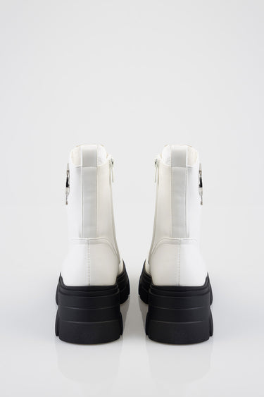 white ankle boots with chunky black sole, back view