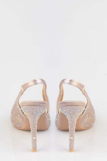 pair of blush pink stiletto heels with rhinestone encrusted heels and ankle straps, viewed from the back