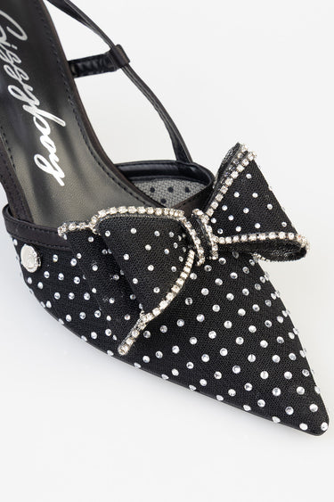 black pointed toe heel with rhinestone bow and studded details, ankle strap, blue jean traders logo on insole