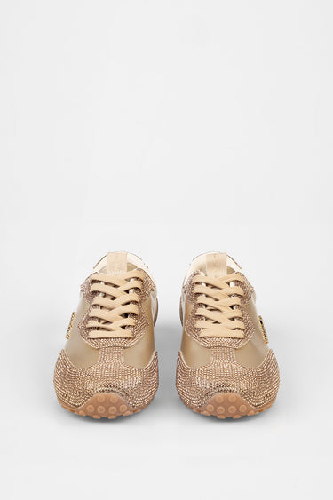 front view of beige rhinestone sneakers with matching laces and gum soles by Blue Jean Traders