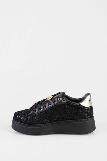 black lace sneakers with a metallic gold heel tab and gold eyelets