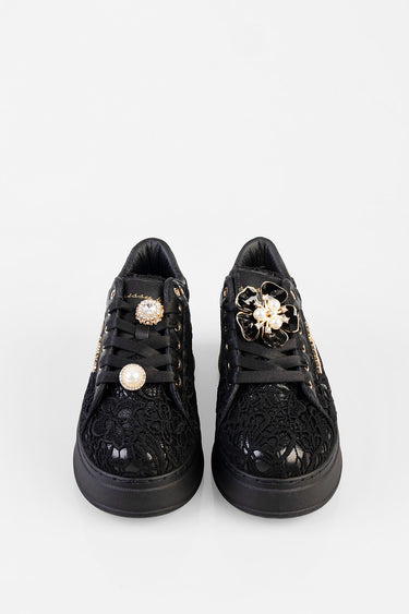 front view of black lace sneakers with pearl and gold jewel pins on the laces by Blue Jean Traders