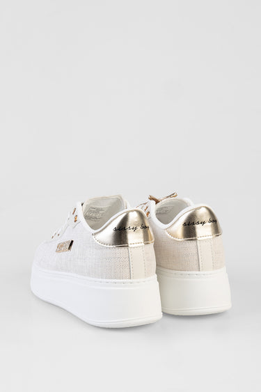 white platform sneakers with gold metallic heel caps and beige knit upper, back view
