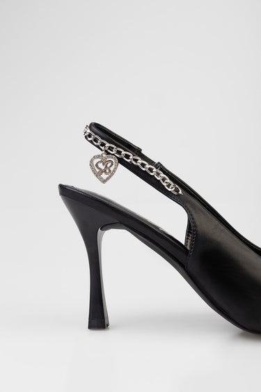 black leather slingback heel with a silver chain ankle strap and a heart charm pendant