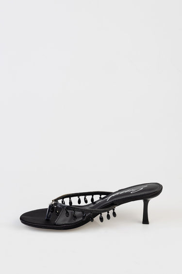 black beaded strap sandal with a slender thong and a small kitten heel