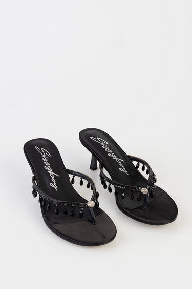 black heeled sandals with bead tassels and a thong strap by Blue Jean Traders