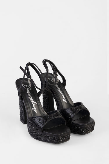 Blue Jean Traders black glitter platform heels with ankle straps