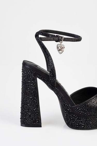 black glitter block heel sandal with ankle strap and heart charm pendant