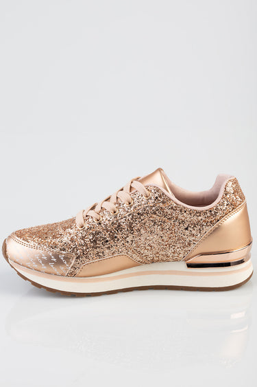 rose gold glitter sneakers with laces and a white midsole and tan outsole, side view
