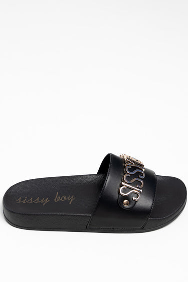 black flat slide sandal with a wide strap and metallic chain detail across the top