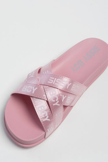 pink Blue Jean Traders slide sandal with crossed straps and light logo lettering
