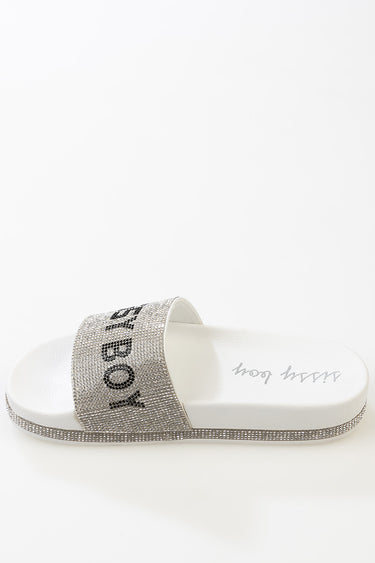 blue jean traders slide sandal with a sparkly rhinestone strap and white footbed