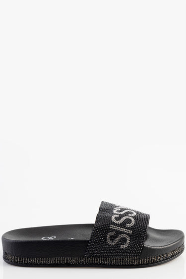 black slide sandal with a rhinestone encrusted strap and beaded trim along the sole