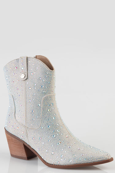 silver western boot covered in rhinestones with a chunky wooden heel
