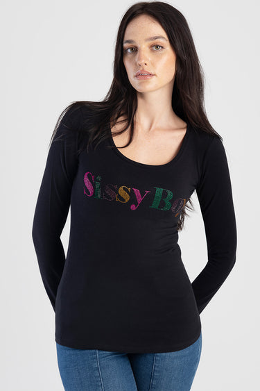 woman in black long sleeve top with a multicoloured Sissy Boy logo across the chest, wearing blue jeans