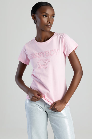 pink short sleeve top with stitched letters on the chest, worn by a model in light blue jeans