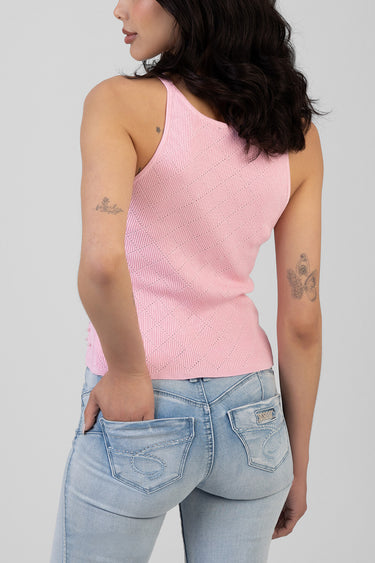 pink knit sleeveless top with diamond pattern from Blue Jean Traders, paired with light wash jeans