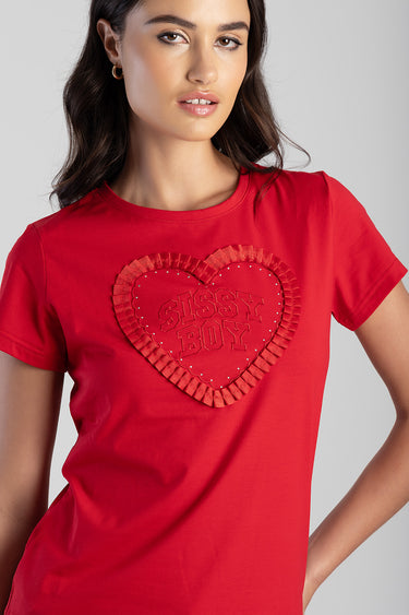red short sleeve top with a large heart applique and ruffled edge on the chest