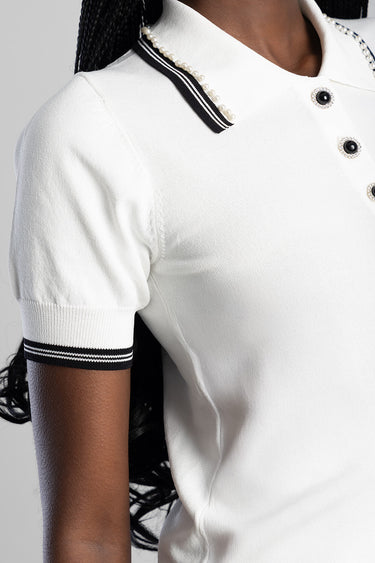 white knit polo top with black striped collar and sleeve cuffs, pearl buttons, by Blue Jean Traders