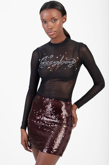 model wearing sheer black long sleeve top with rhinestone script and a burgundy sequined mini skirt