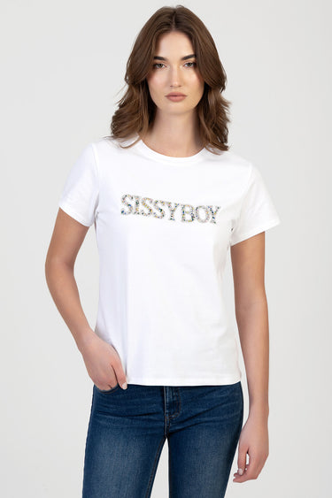 woman in white regular t shirt with sparkly logo across chest, wearing blue jeans